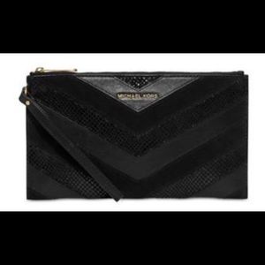 Michael Kors Bedford large clutch .